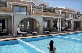 the-ixian-grand-hotellady-by-pool.jpg the-ixian-grand-hotellady-by-pool.jpg